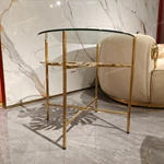 Sculptural Round Glass Sofa Side Table with Gold-Finished Leaf Detail and Textured Metal Frame
